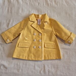 Gymboree girls 6-12 months Sunflower Fields rain coat has some crazing